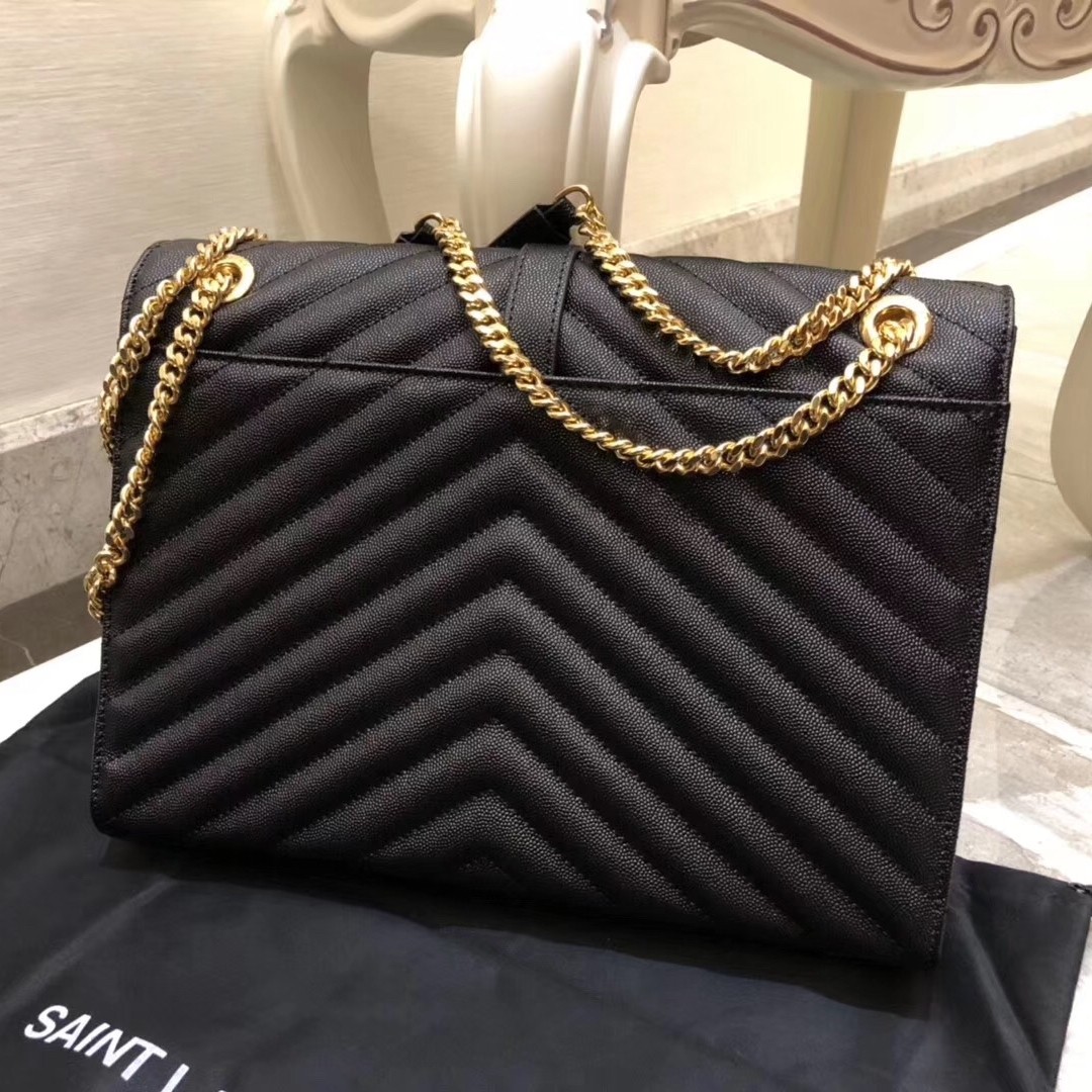 Sa**t Lau*nt envelope large bag in black quilted leather