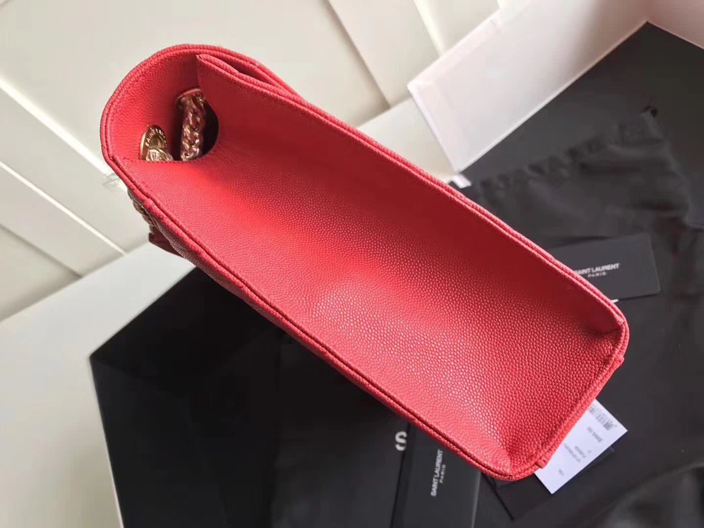 Sa**t Lau*nt envelope large bag in red quilted leather