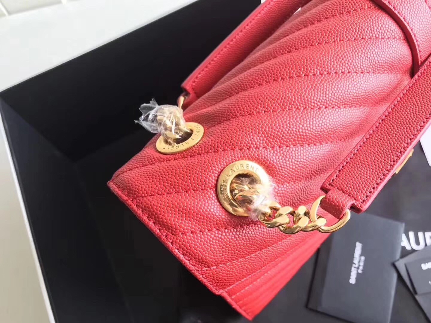 Sa**t Lau*nt envelope large bag in red quilted leather