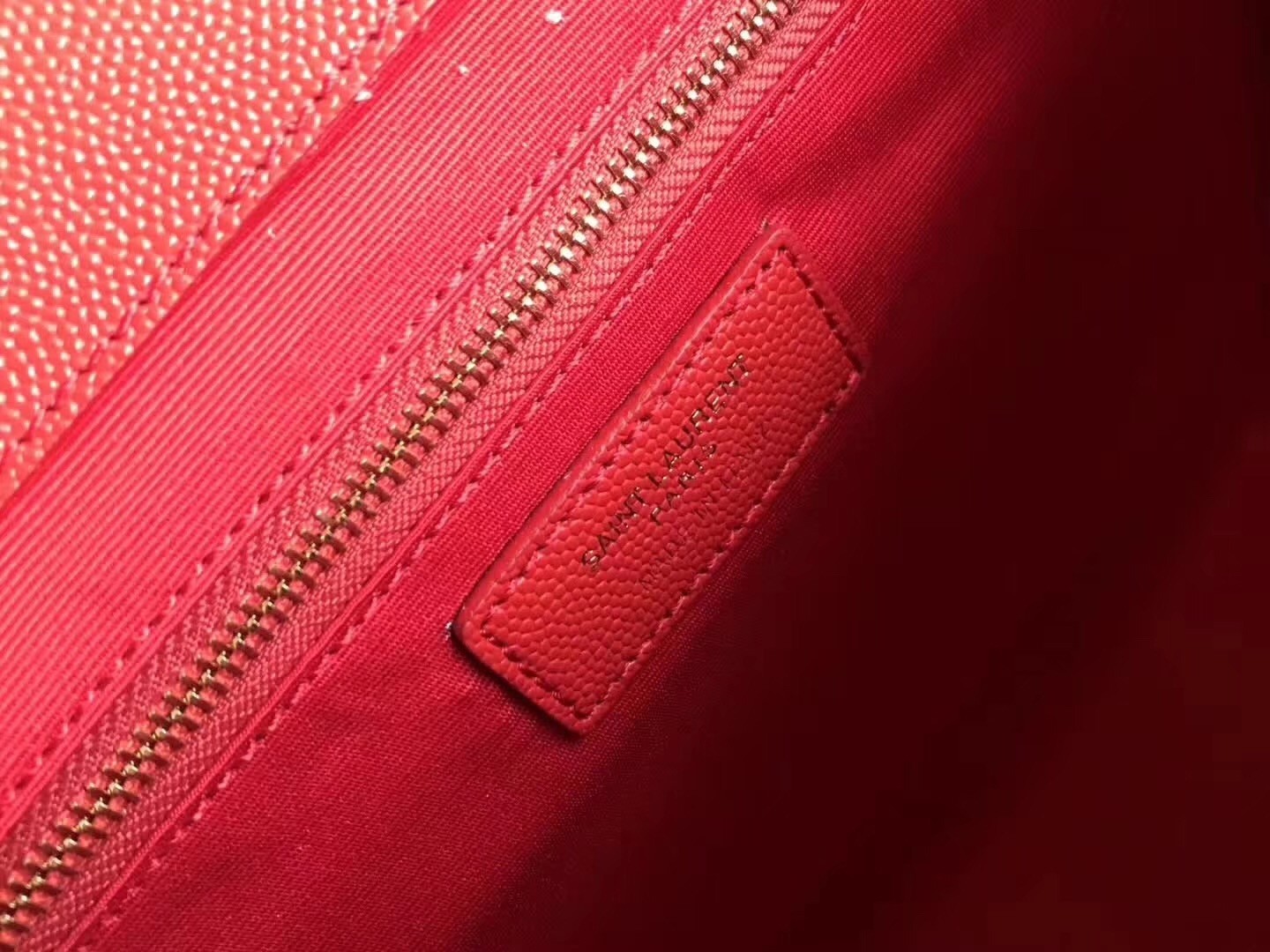 Sa**t Lau*nt envelope large bag in red quilted leather
