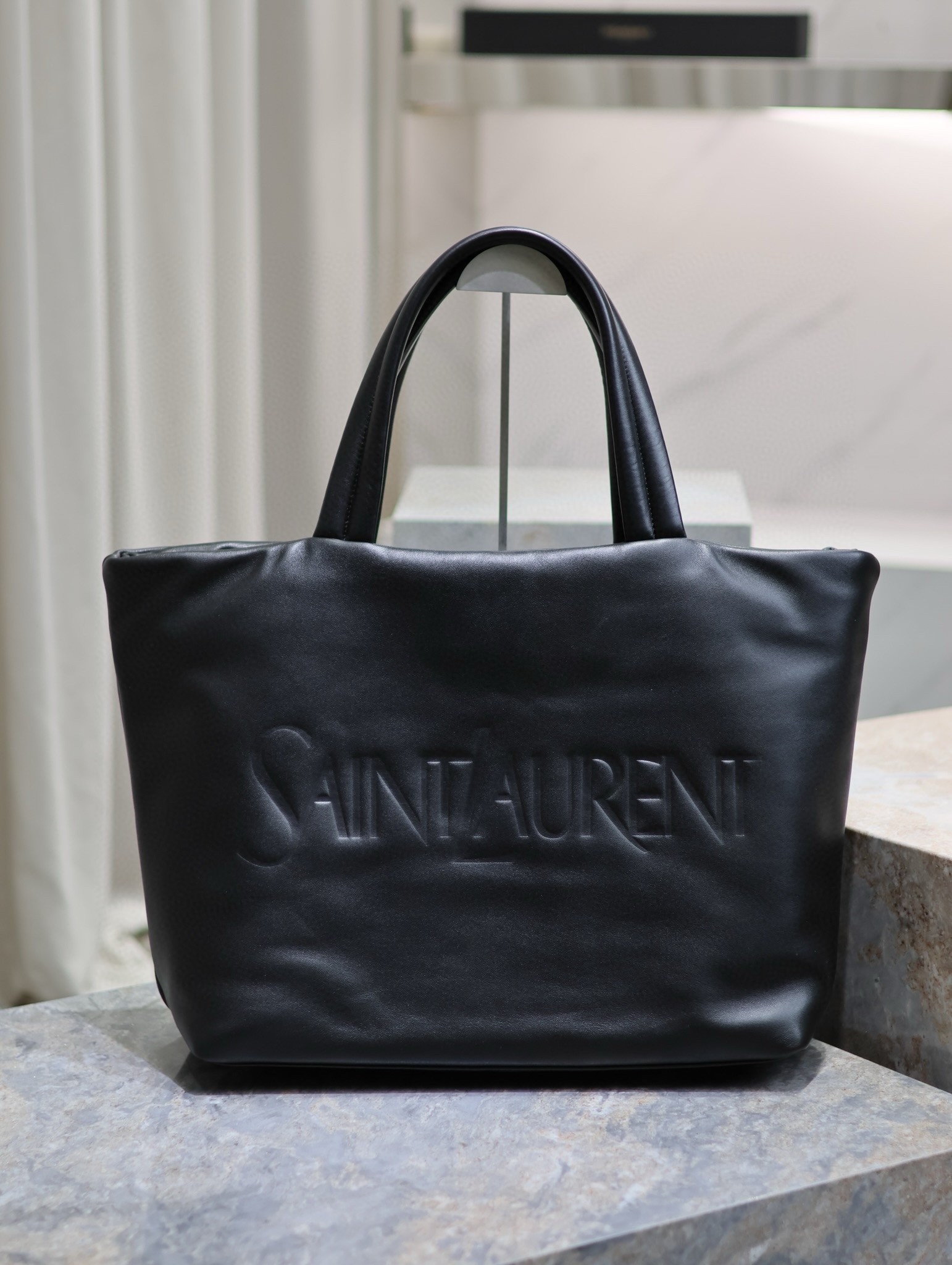 Sa**t Lau*nt wide puffer tote bag in black nappa lambskin