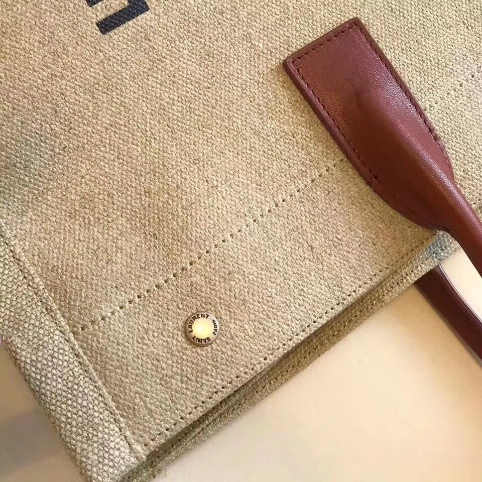 Sa**t Lau*nt rive gauche tote bag with tan handle
