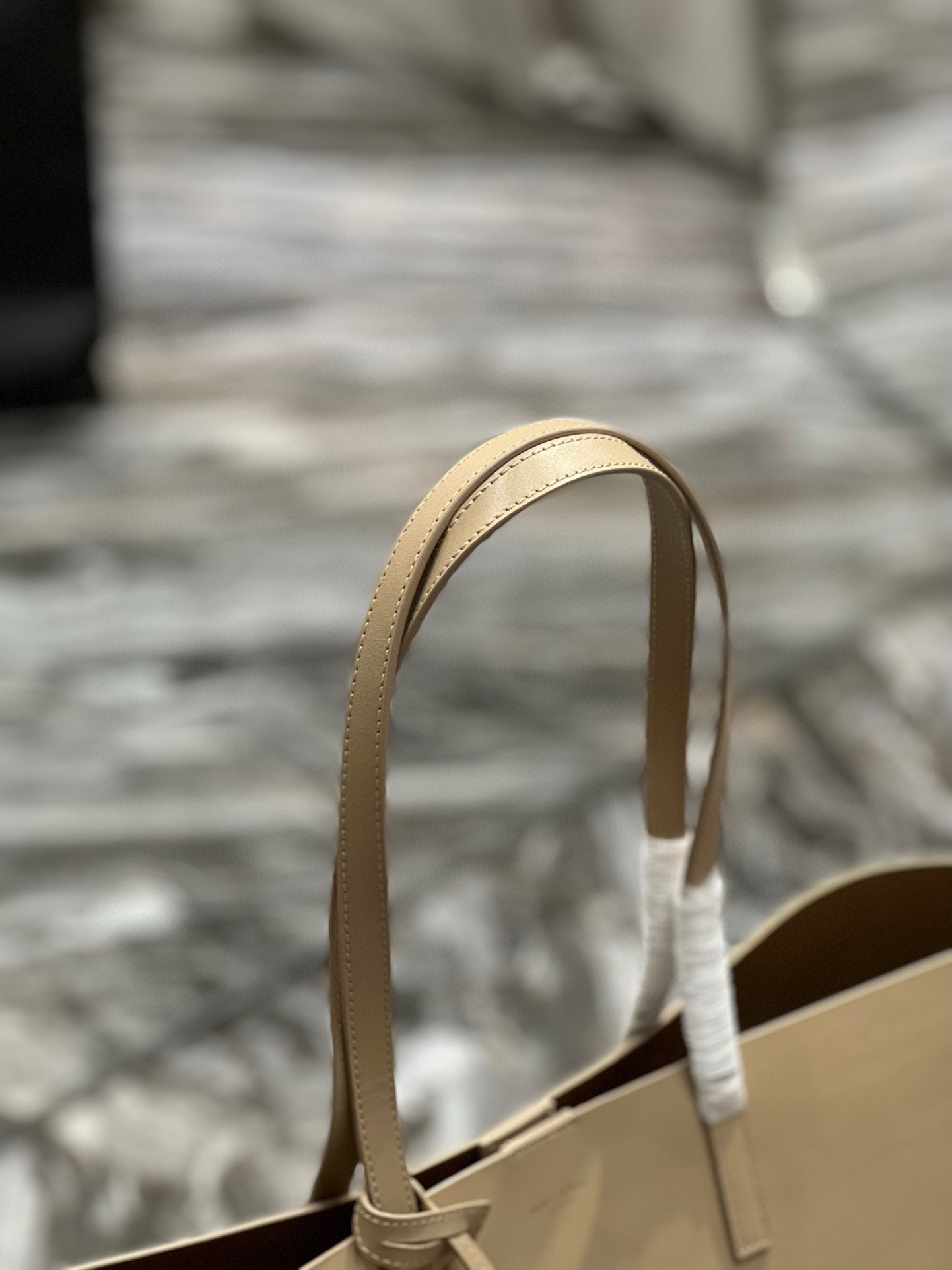 Sa**t Lau*nt shopping tote bag in beige leather