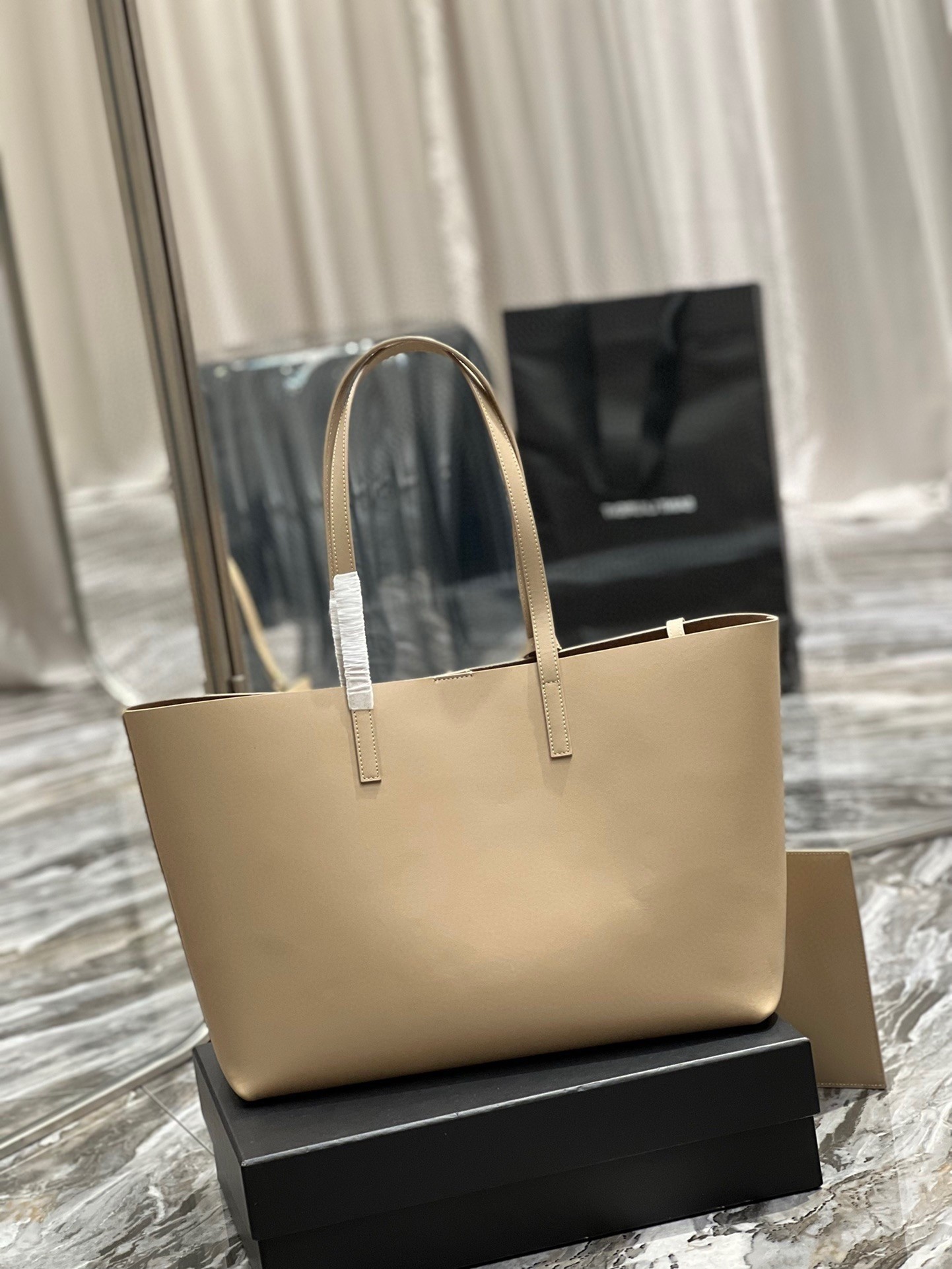 Sa**t Lau*nt shopping tote bag in beige leather