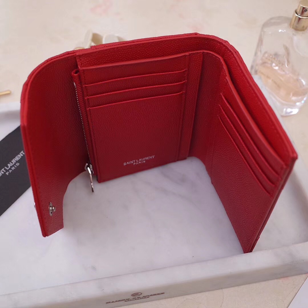Sa**t Lau*nt compact tri fold wallet in red leather